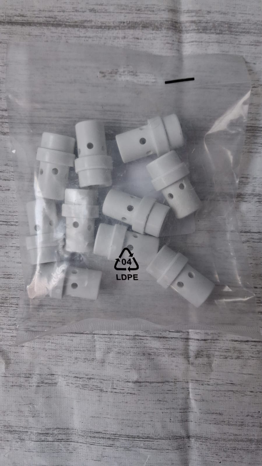 Gas diffusers for welding torches